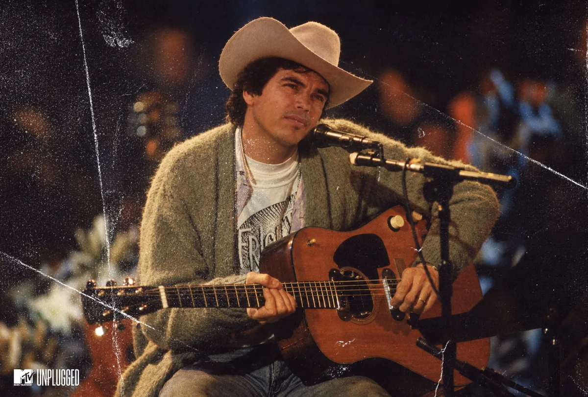 An edited photo of Kurt Cobain at MTV Unplugged, with the head of Chalino Sánchez wearing a sombrero